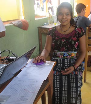 Photo of a woman at the hearing aid program